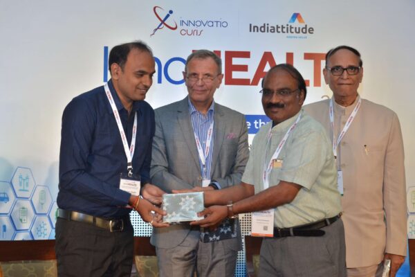 Dr D Prabhakaran presenting mememto to Dr Pranav Kumar Gupta at InnoHEALTH 2017 Dr D Prabhakaran presenting mememto to Dr Pranav Kumar Gupta at InnoHEALTH 2017