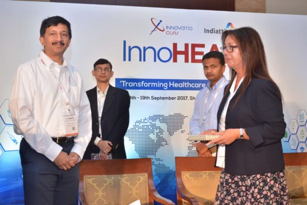 Sandipan Gangopadhyay presenting a memento to Marilia Cavaco at InnoHEALTH 2017 Sandipan Gangopadhyay presenting a memento to Marilia Cavaco at InnoHEALTH 2017
