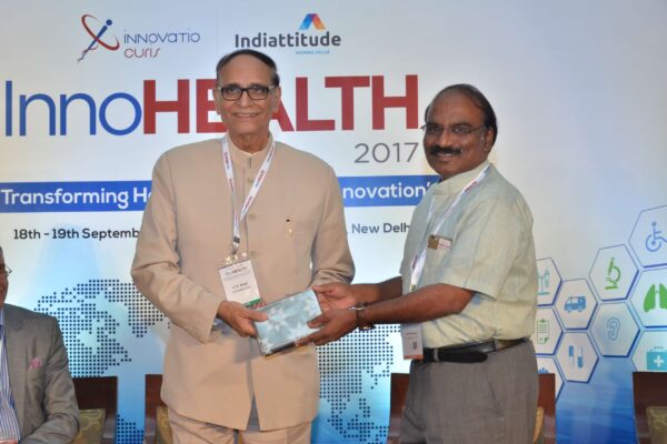 Dr D Prabhakaran presenting mememto to Dr V K Singh at InnoHEALTH 2017 Dr D Prabhakaran presenting mememto to Dr V K Singh at InnoHEALTH 2017