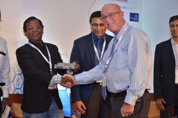 Ronald Heslegrave presenting memento to Eur Ing Muthu Singaram at InnoHEALTH 2017 Ronald Heslegrave presenting memento to Eur Ing Muthu Singaram at InnoHEALTH 2017