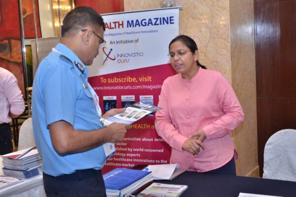 Mamta from Optimaser briefing an attendee at InnoHEALTH 2017 Mamta from Optimaser briefing an attendee at InnoHEALTH 2017