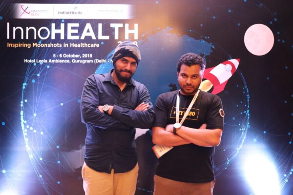 11. (L-R)Dhruv Singh and Clarion Smith pose at the moonshot corner of InnoHEALTH 2018 11. (L-R)Dhruv Singh and Clarion Smith pose at the moonshot corner of InnoHEALTH 2018