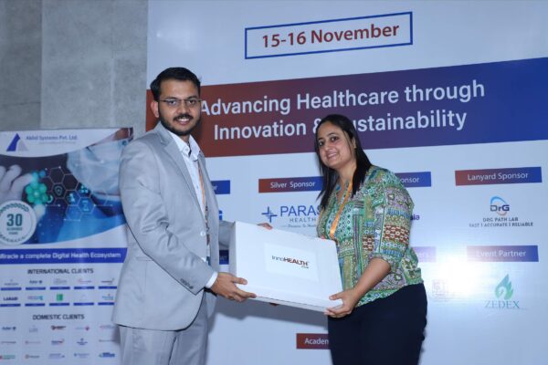 11. Dr. Hara Prasad Mishra presenting memento of appreciation to Ankita Agarwal at InnoHEALTH 2024 11. Dr. Hara Prasad Mishra presenting memento of appreciation to Ankita Agarwal at InnoHEALTH 2024