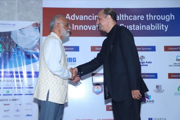 11. Prof. Dr. Sanjiv Kumar from Three Domain Health Leadership Foundation shakes hands with Dr. Ravi Gaur from DRG Labs in InnoHEALTH 2024.JPG 11. Prof. Dr. Sanjiv Kumar from Three Domain Health Leadership Foundation shakes hands with Dr. Ravi Gaur from DRG Labs in InnoHEALTH 2024.JPG