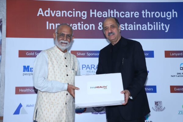 12. Prof. Dr. Sanjiv Kumar from Three Domain Health Leadership Foundation presenting memento of appreciation to Dr. Ravi Gaur from DRG Labs in InnoHEALTH 2024-2 12. Prof. Dr. Sanjiv Kumar from Three Domain Health Leadership Foundation presenting memento of appreciation to Dr. Ravi Gaur from DRG Labs in InnoHEALTH 2024-2