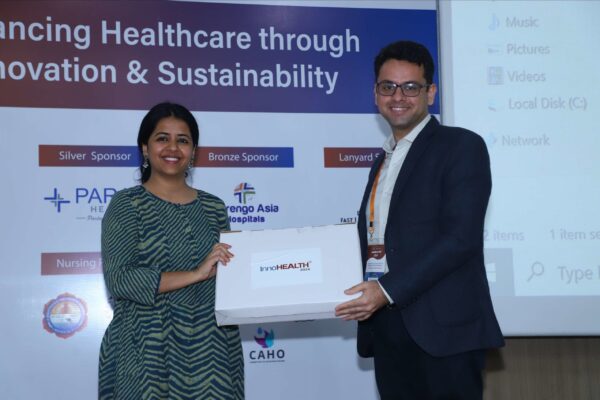 14. Dr. Sarah Iqbal Hyder presenting memento of appreciation to Dr. Ankur Mutreja in Climate Change session at InnoHEALTH 2024 14. Dr. Sarah Iqbal Hyder presenting memento of appreciation to Dr. Ankur Mutreja in Climate Change session at InnoHEALTH 2024