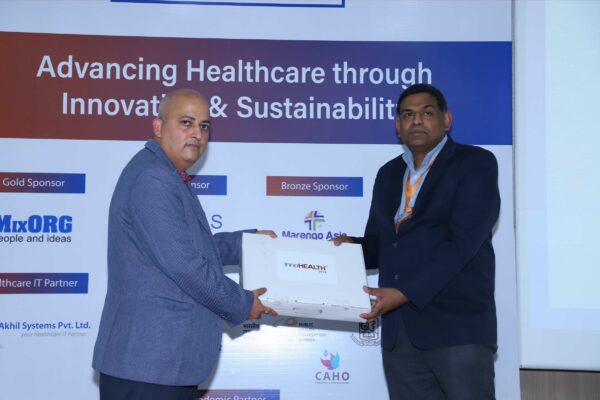 22. Sachin Gaur from InnovatioCuris presenting memento of appreciation to Ganesh Gopalan from Gnani.ai in Large Language Models in Healthcare Delivery session at InnoHEALTH 2024-2 22. Sachin Gaur from InnovatioCuris presenting memento of appreciation to Ganesh Gopalan from Gnani.ai in Large Language Models in Healthcare Delivery session at InnoHEALTH 2024-2
