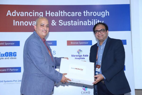 24. Sachin Gaur from InnovatioCuris presenting memento of appreciation to Dr. Amit Raj from Plexus Medcare in Large Language Models in Healthcare Delivery session at InnoHEALTH 2024 24. Sachin Gaur from InnovatioCuris presenting memento of appreciation to Dr. Amit Raj from Plexus Medcare in Large Language Models in Healthcare Delivery session at InnoHEALTH 2024