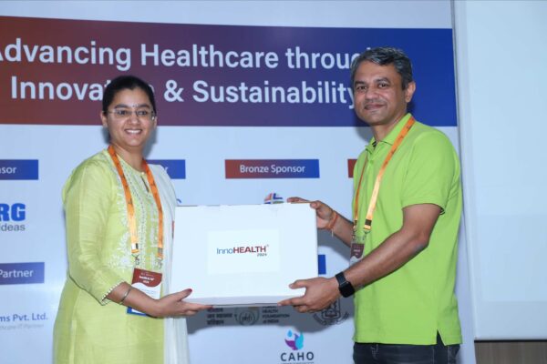 25. Dr. Jaspreet Kaur Dhanjal presenting a memento of appreciation to Cdr. Gaurav Sharma at InnoHEALTH 2024 Dr. Jaspreet Kaur Dhanjal presenting a memento of appreciation to Cdr. Gaurav Sharma at InnoHEALTH 2024