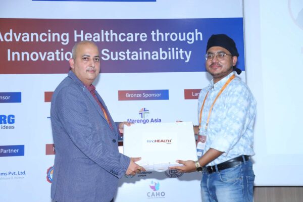 25. Sachin Gaur from InnovatioCuris presenting memento of appreciation to Dr. Suvrankar Datta from AIIMS Delhi in Large Language Models in Healthcare Delivery session at InnoHEALTH 2024 25. Sachin Gaur from InnovatioCuris presenting memento of appreciation to Dr. Suvrankar Datta from AIIMS Delhi in Large Language Models in Healthcare Delivery session at InnoHEALTH 2024