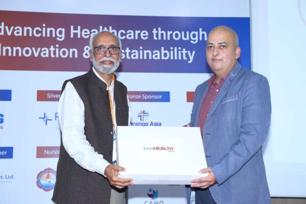 27. Dr. Vijay Agarwal from CAHO presenting memento of appreciation to Sachin Gaur from InnovatioCuris in Large Language Models in Healthcare Delivery session at InnoHEALTH 2024 27. Dr. Vijay Agarwal from CAHO presenting memento of appreciation to Sachin Gaur from InnovatioCuris in Large Language Models in Healthcare Delivery session at InnoHEALTH 2024