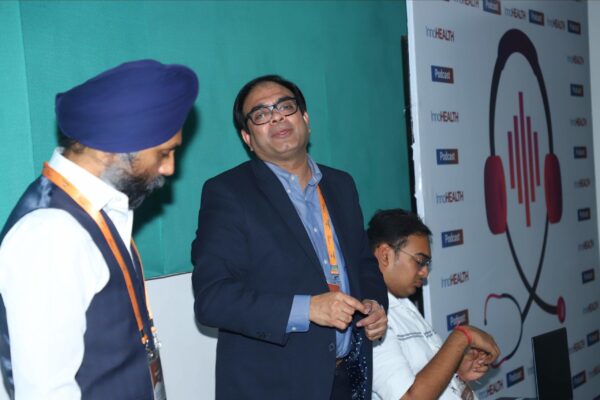 Dr. Amit Raj from Plexus Medcare and Dr. Tavpritesh Sethi from IIIT Delhi in a discussion at the workshop on conversational AI at InnoHEALTH 2024