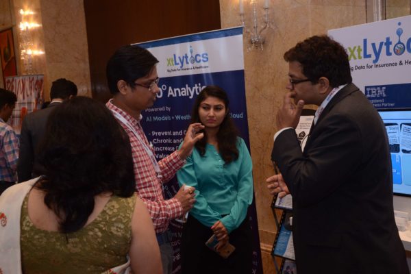 Deepak Mittal from xtylitics and attendees of InnoHEALTH 2017 discuss ideas and prospects at the xtylitics booth
