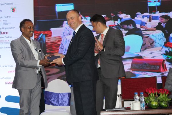 8. Prof S Venkataramanaiah, chairperson for the young innovators award receives a memento from H.E Riho Kruuv at InnoHEALTH 2018